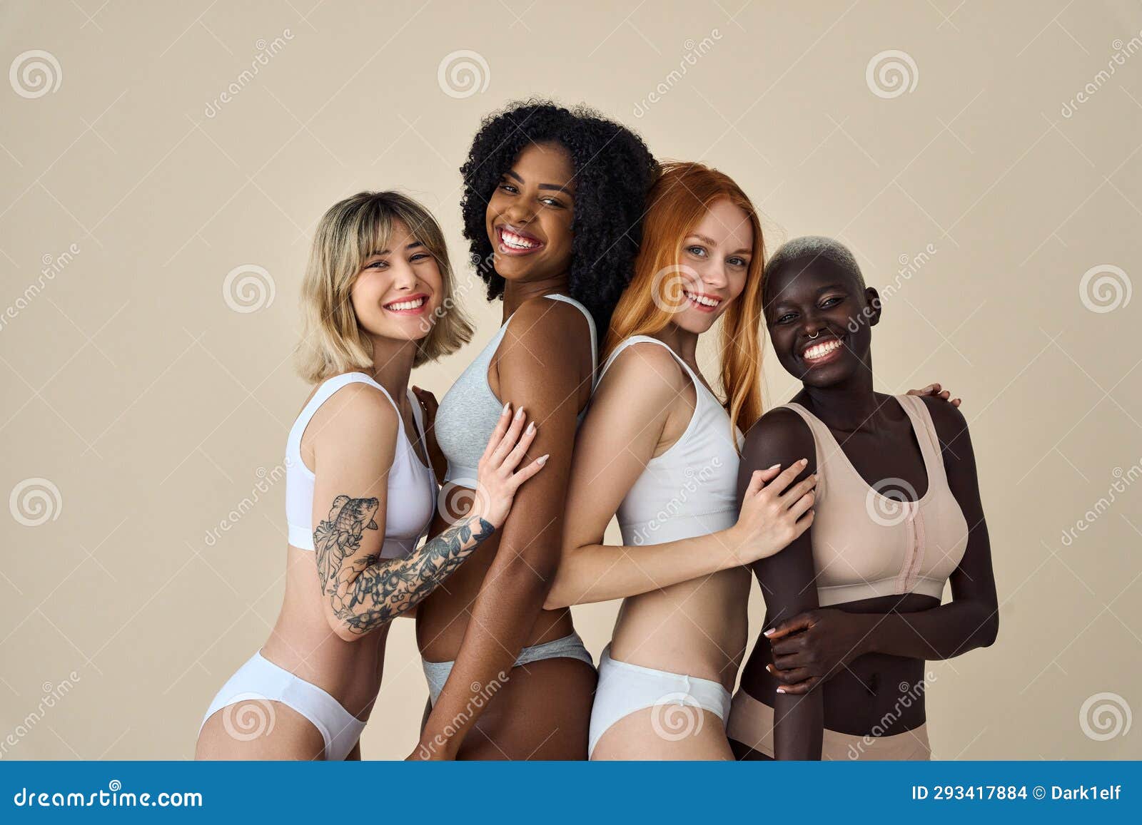 4 Happy Diverse Young Girls in Underwear Hugging Isolated on Beige  Background. Stock Photo - Image of looking, models: 293417884