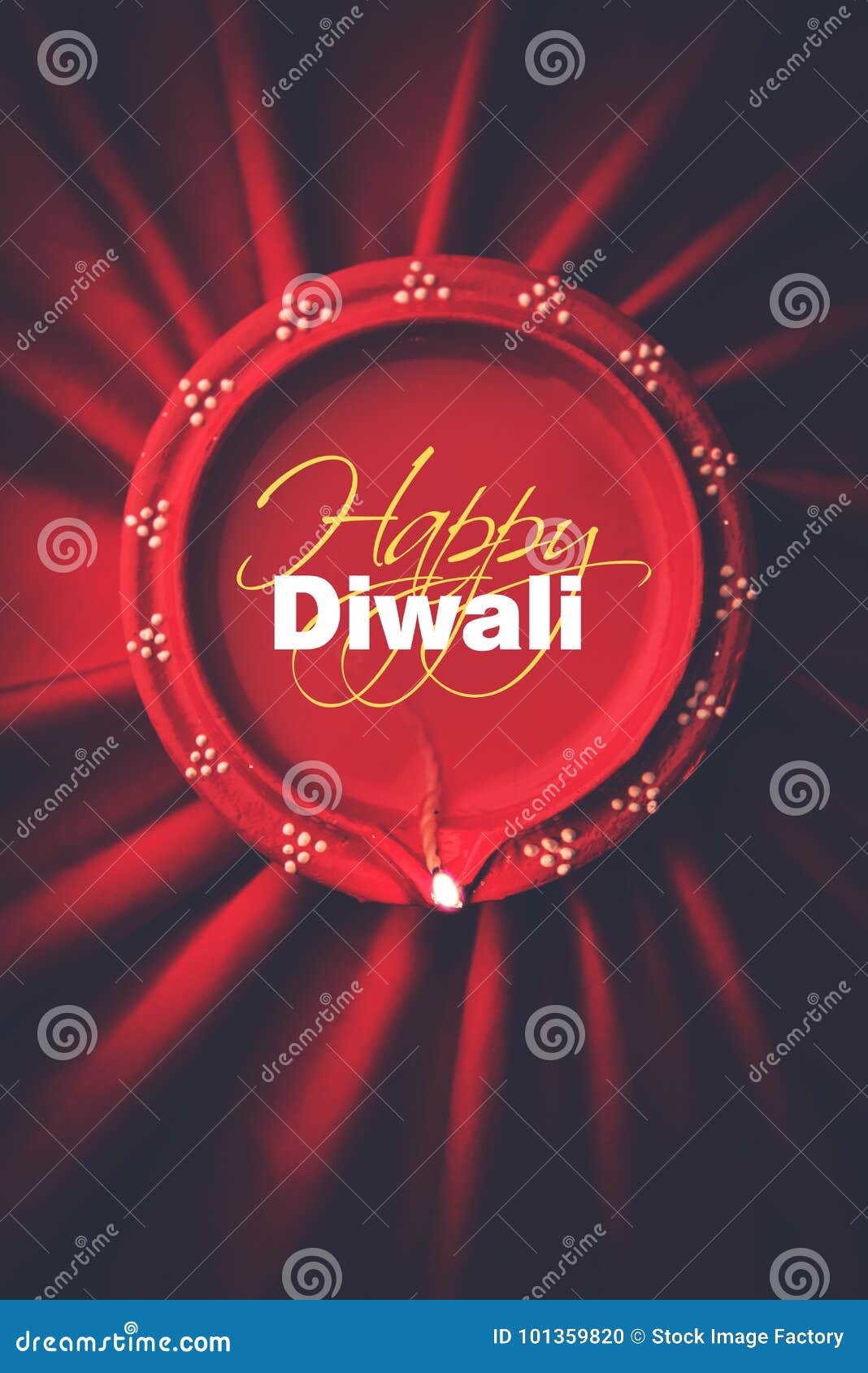 stock photo of diwali diya or clay lamp over red silk or satin cloth background, happy diwali greeting