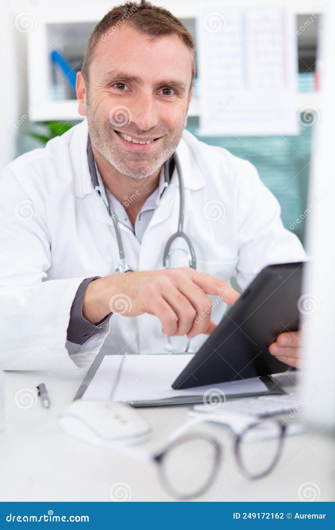 Happy Doctor Working with Computer in Office Stock Photo - Image of ...