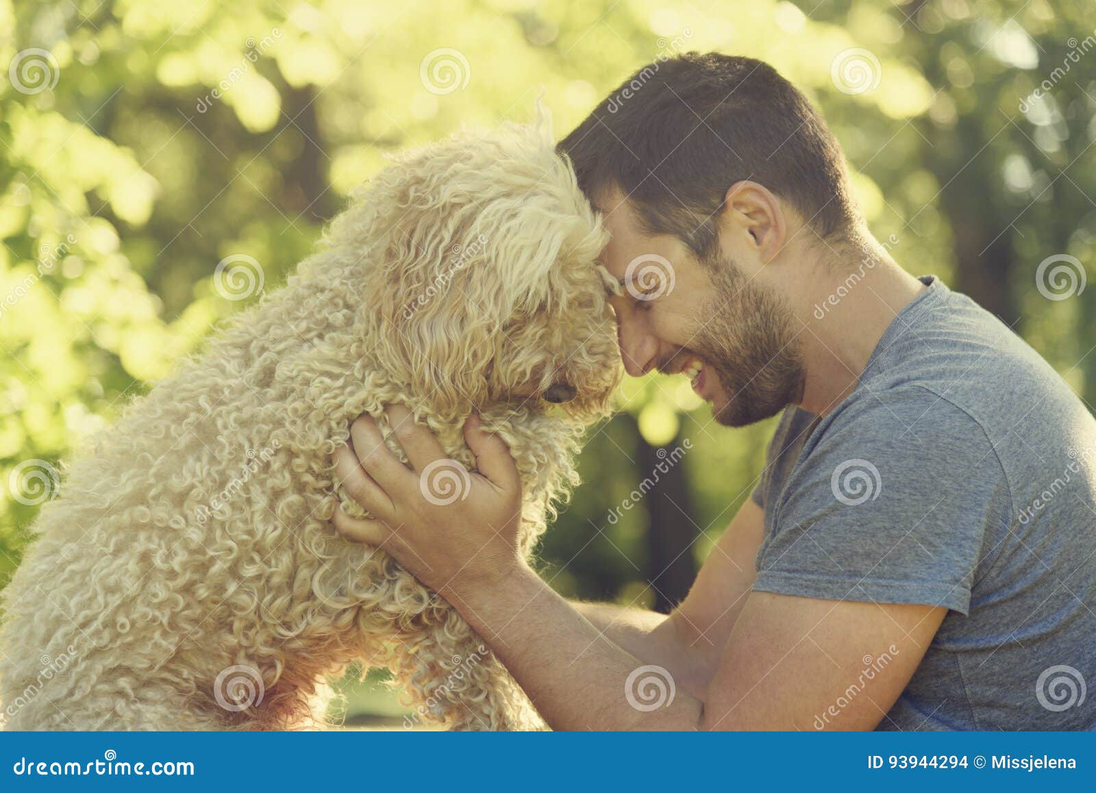 happy dog and his owner