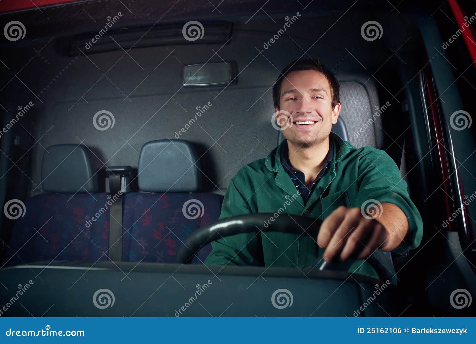 happy driver holding wheel