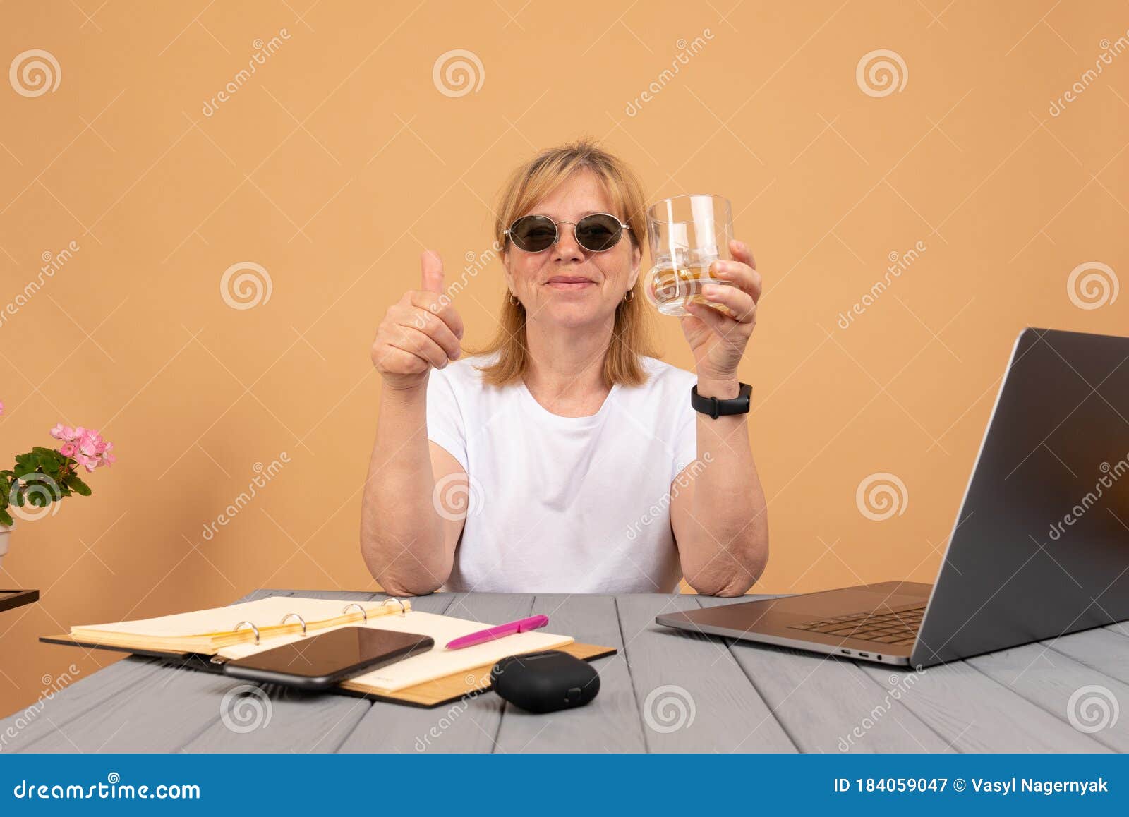 Happy Drunk Elderly Woman In Sunglasses Drinking Whiskey And Working On 