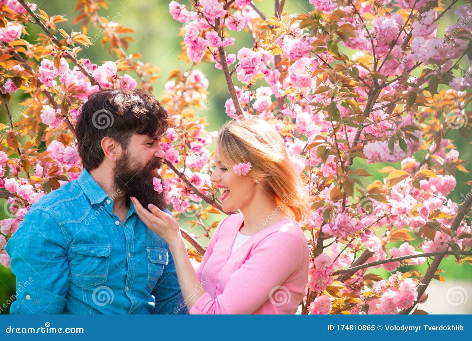 Happy Easter Day. Couple Near Sakura Tree. Happy Couple in Love
