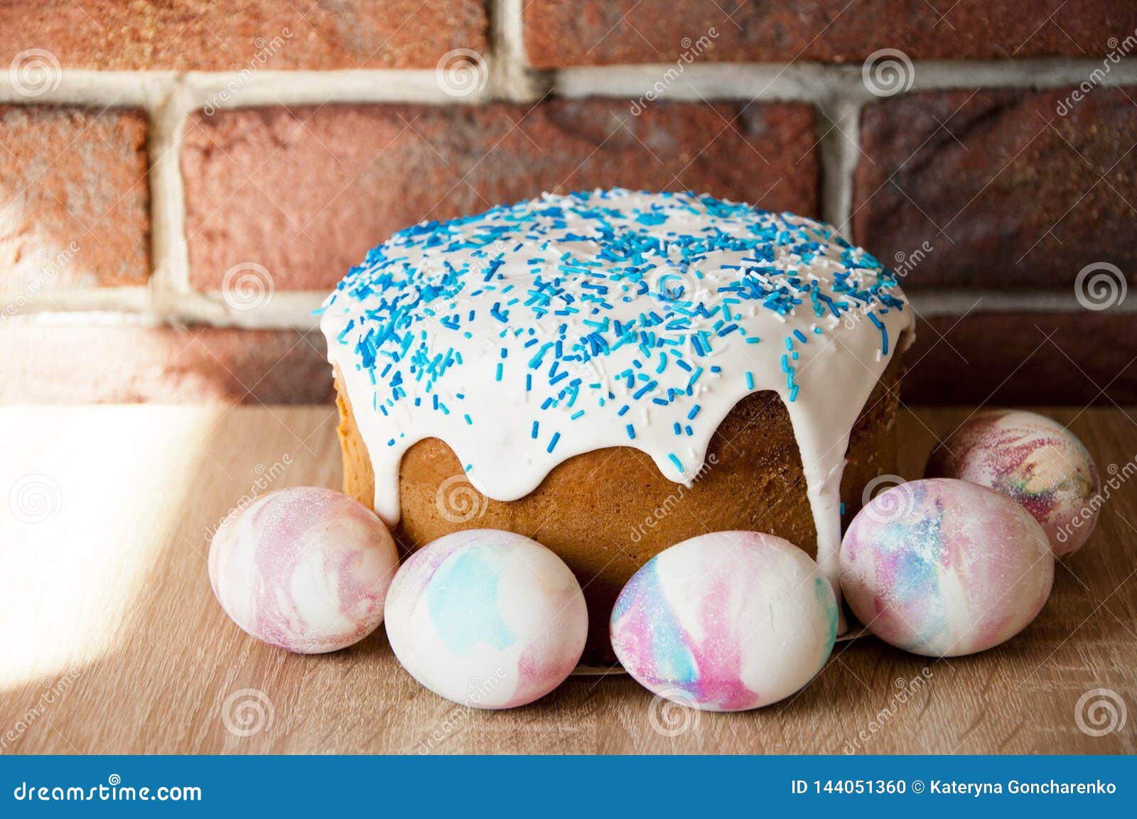 happy easter. dessert. backery. painted eggs. easter cake on table. spring preparation. marble shell. easter cake with sprinkles