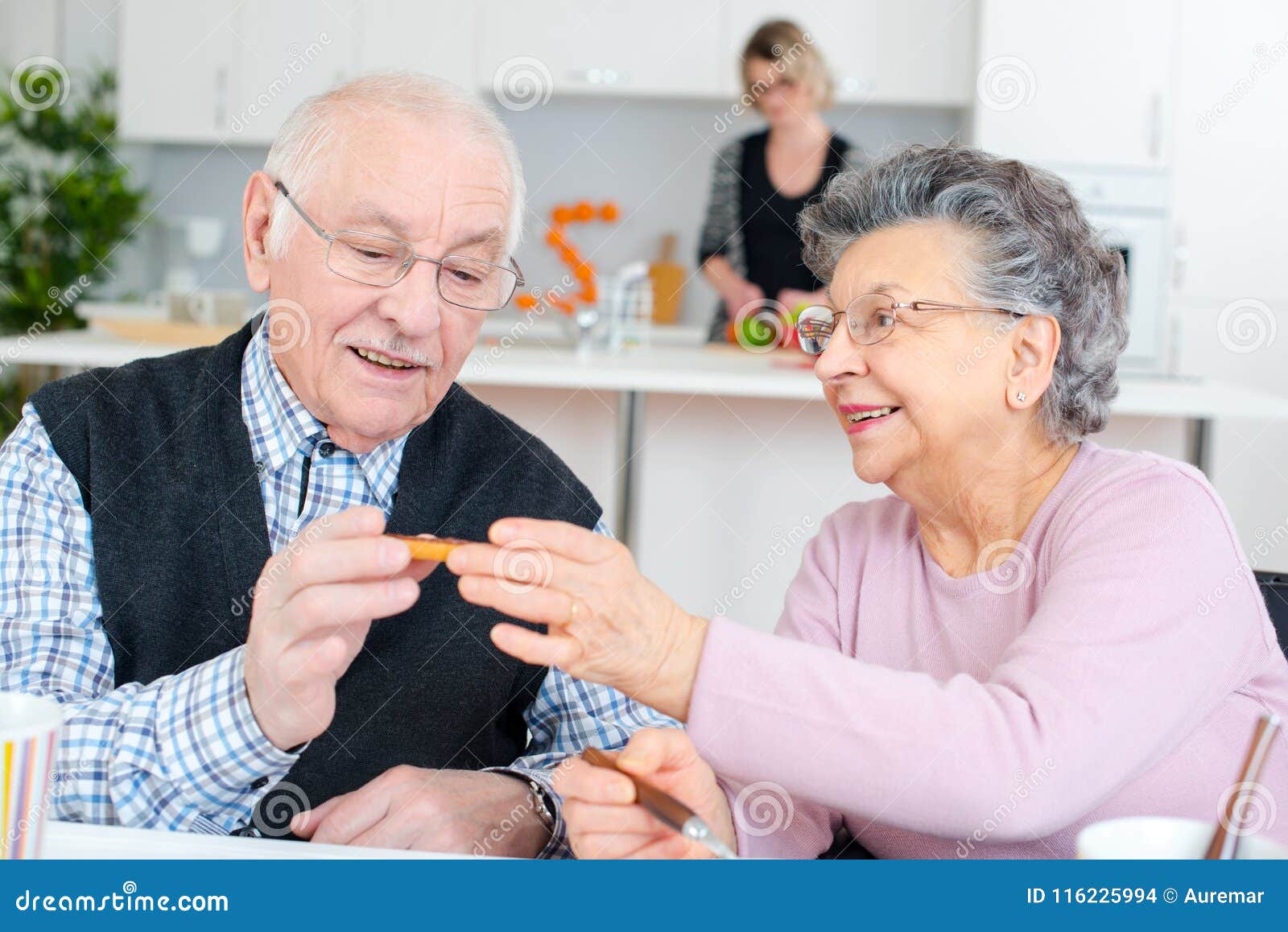 Happy Elderly Couple Eating Dinner Stock Photo Image of eating