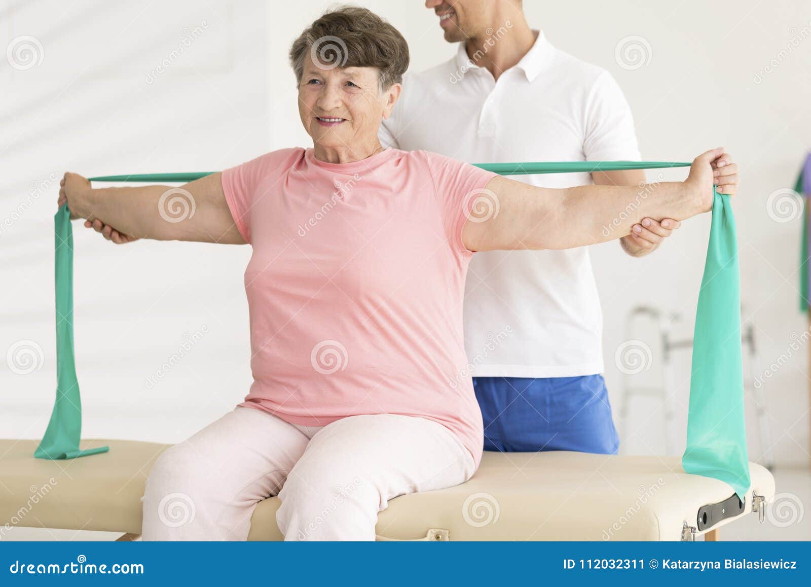 elderly woman stretching during physiotherapy