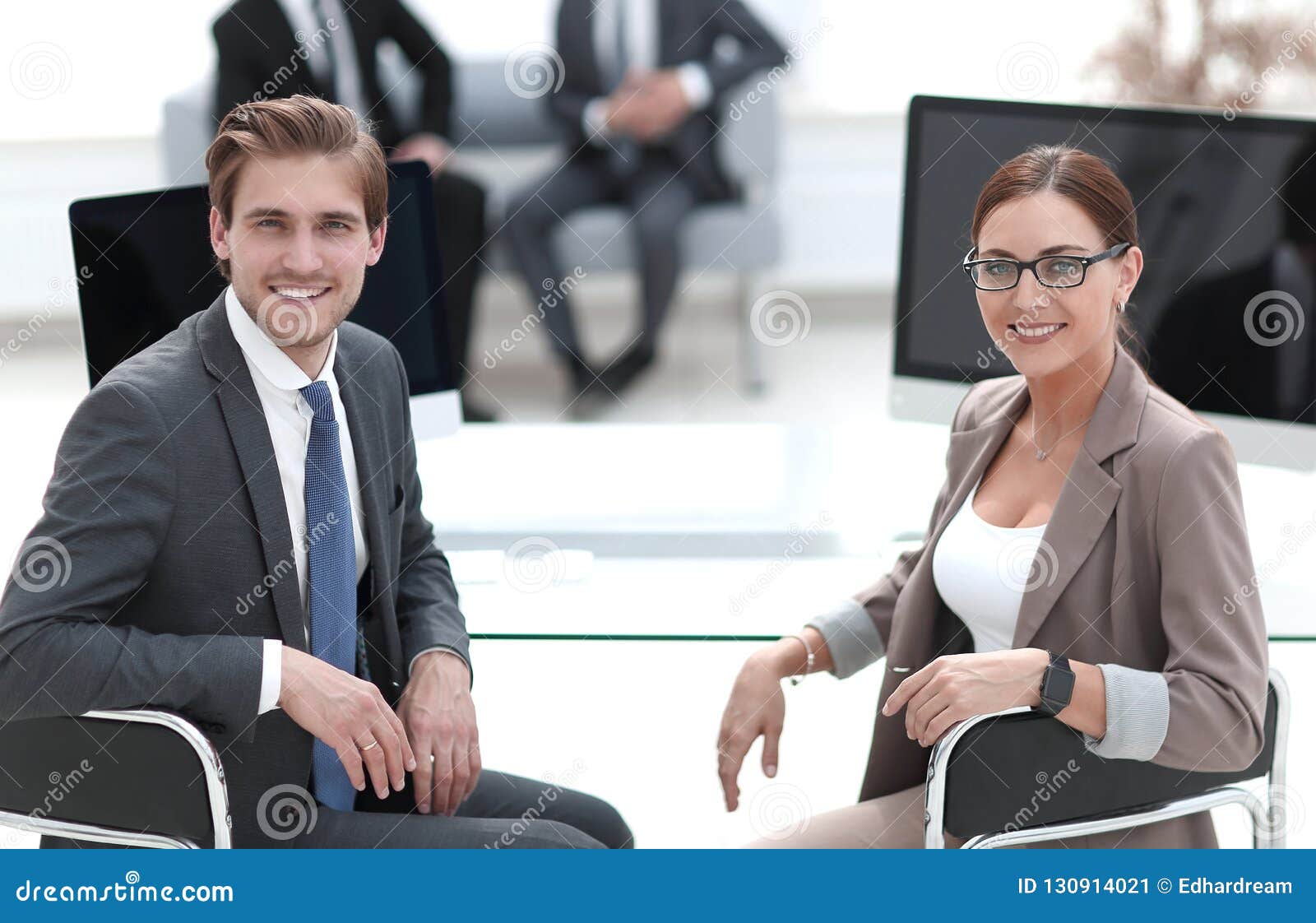 Happy Employees Sitting at the Office Desk Stock Image - Image of ...