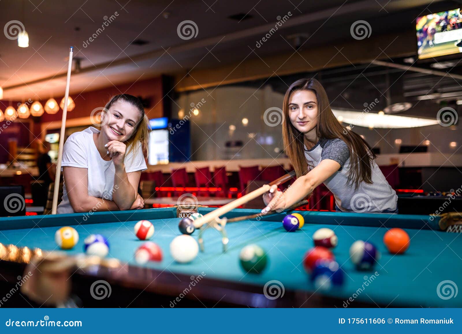 Happy and Excited Women Playing Billiard Together Stock Photo Image