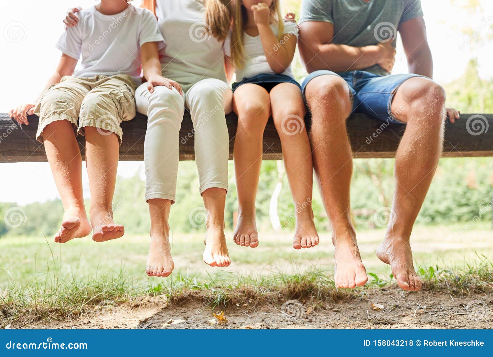 Family is Taking a Break on a Park Bench Stock Photo - Image of rest