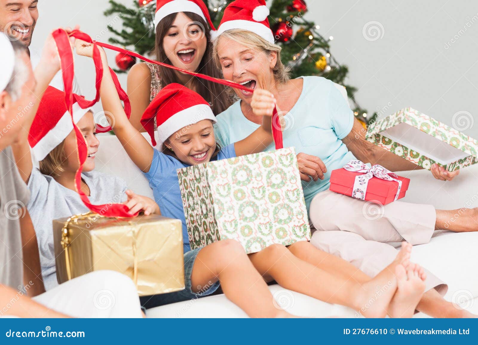 Happy Family at Christmas Opening Gifts Together Stock Photo Image of Family At Christmas