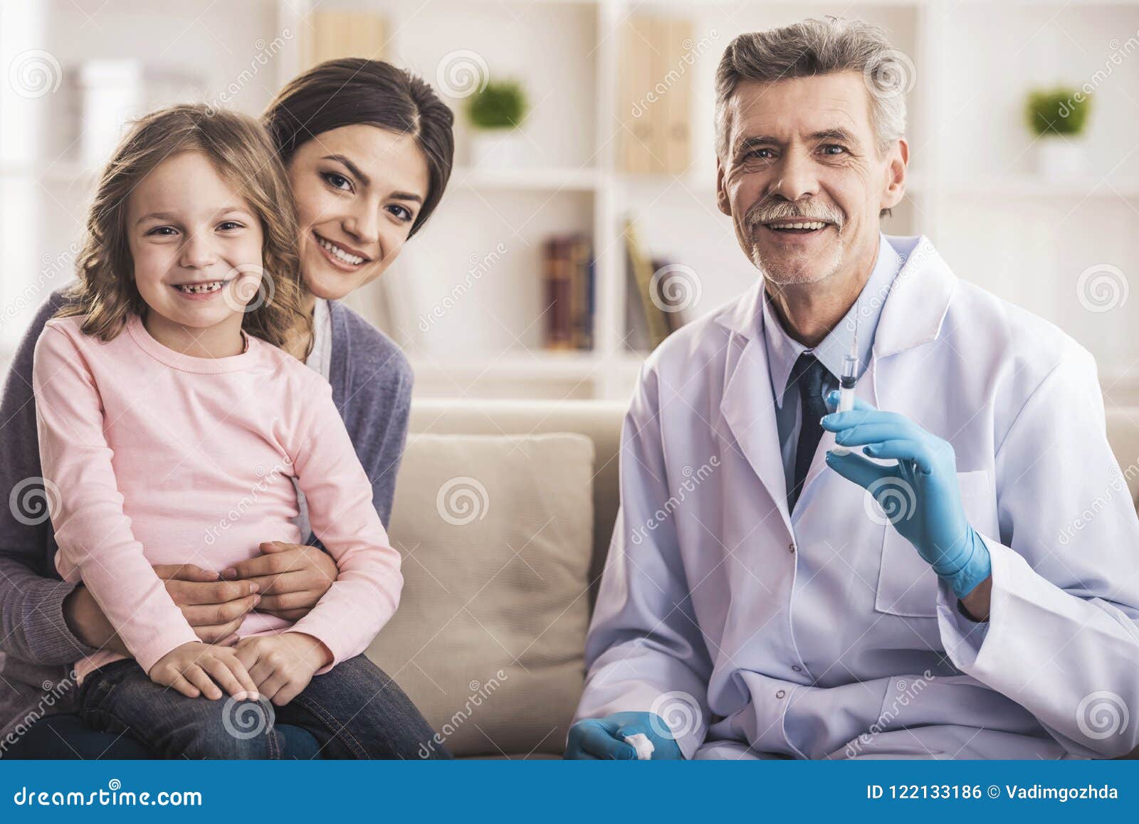 The Family Doctor Is Going To Resign Happy Family with Doctor stock photo. Image of female - 122133186