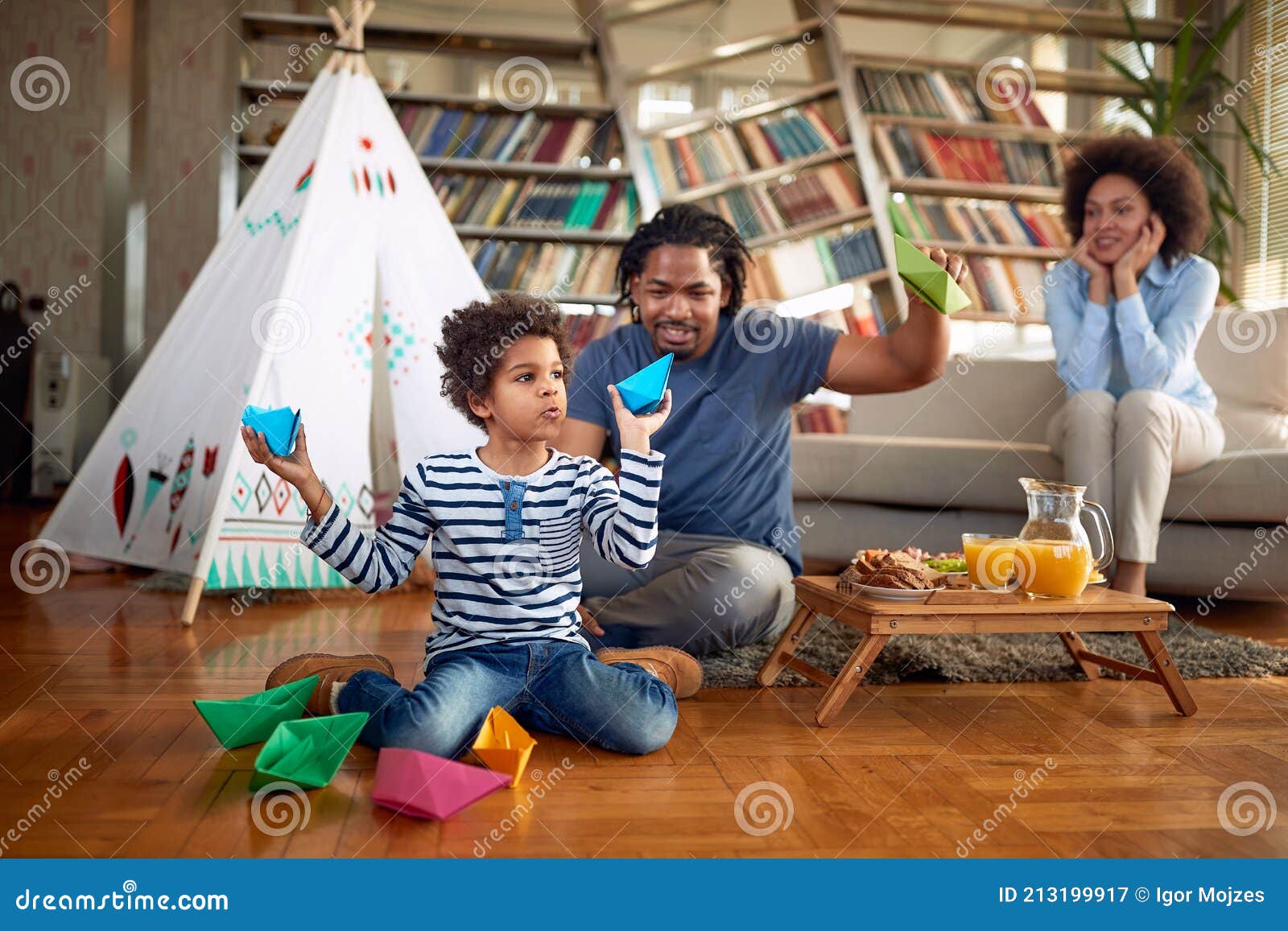 happy family enjoying free time at home together. family, together, love, playtime