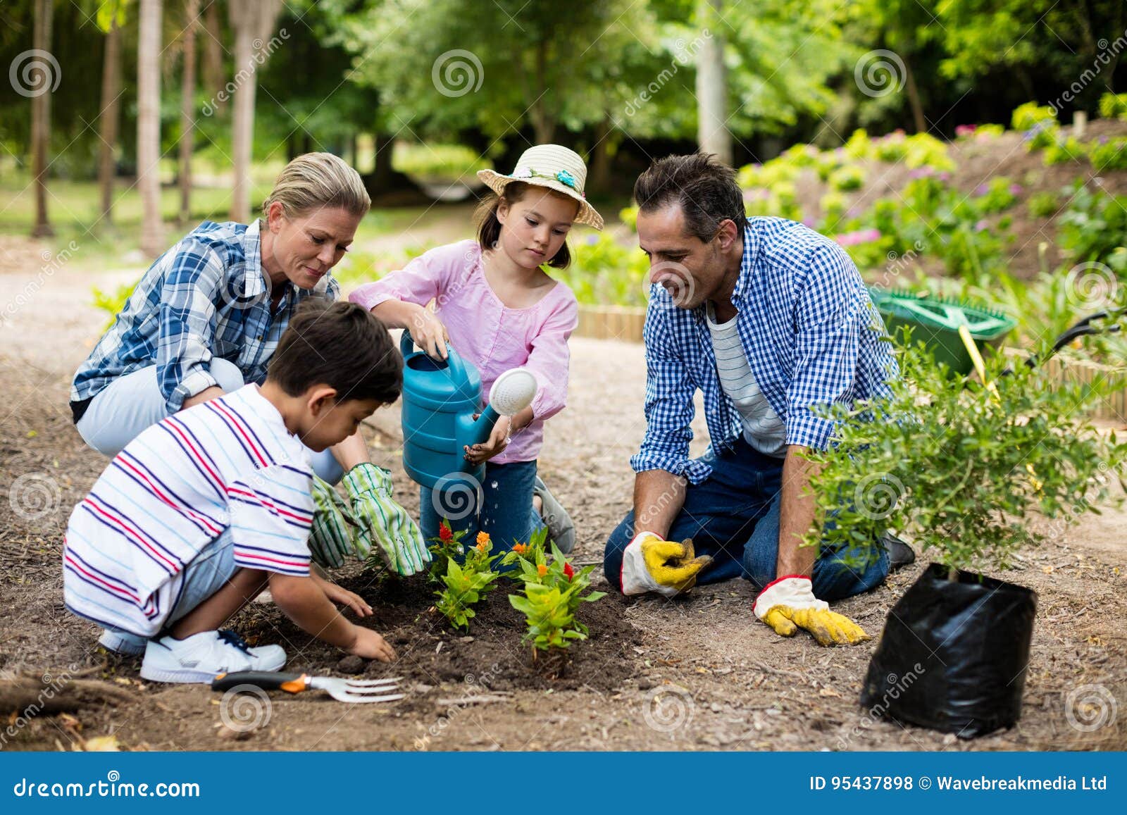 Happy Family Gardening Together Stock Photo - Image of glove, child