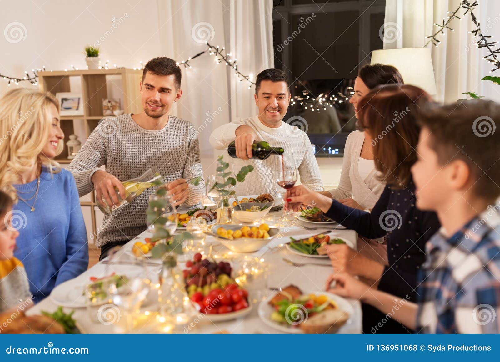 Happy Family Having Dinner Party at Home Stock Photo - Image of