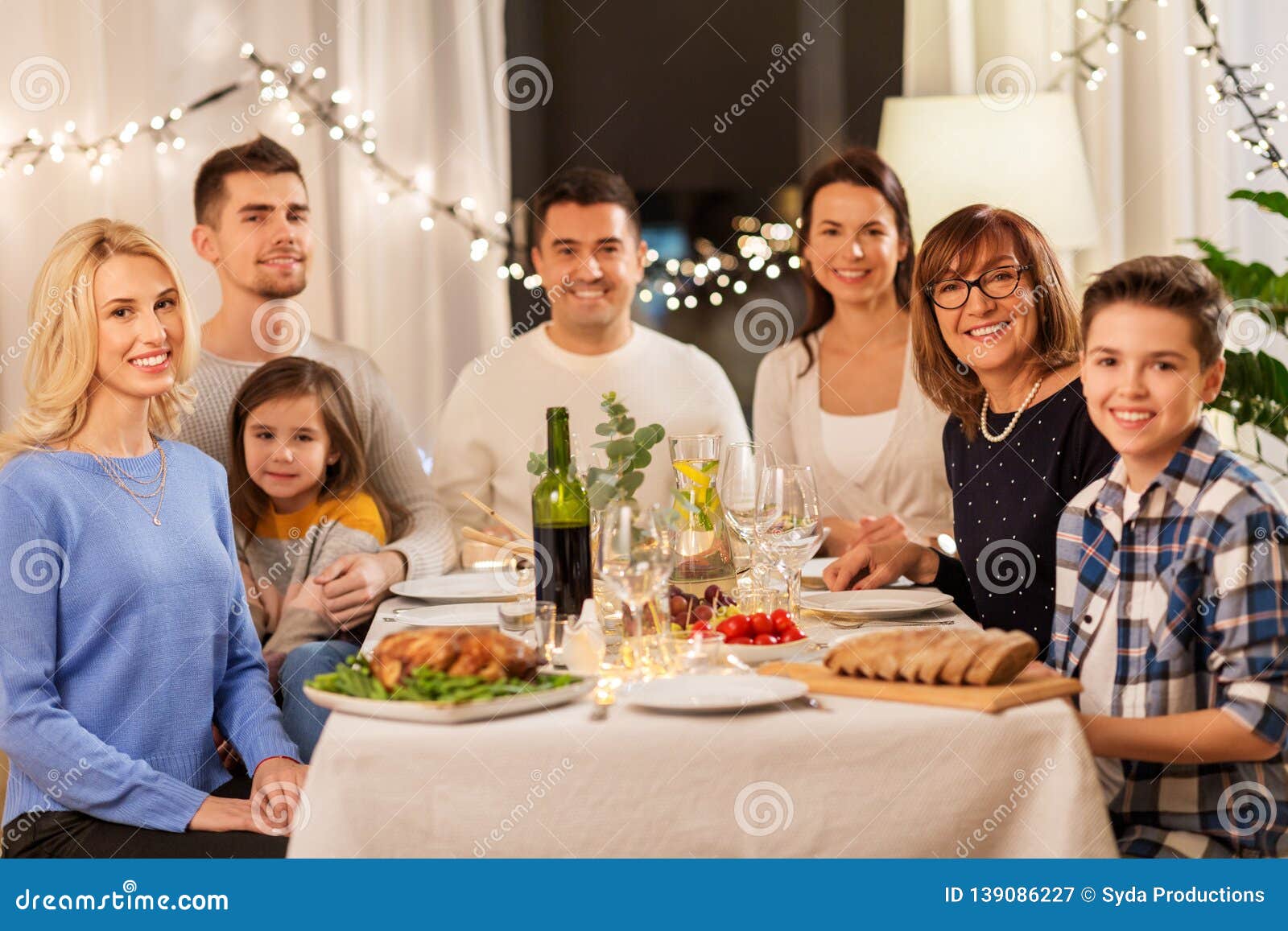 Happy Family Having Dinner Party at Home Stock Image - Image of