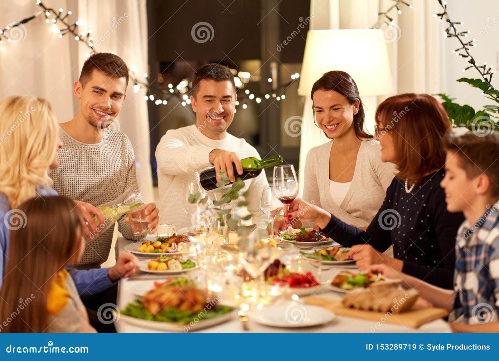 Happy Family Having Dinner Party at Home Stock Image - Image of