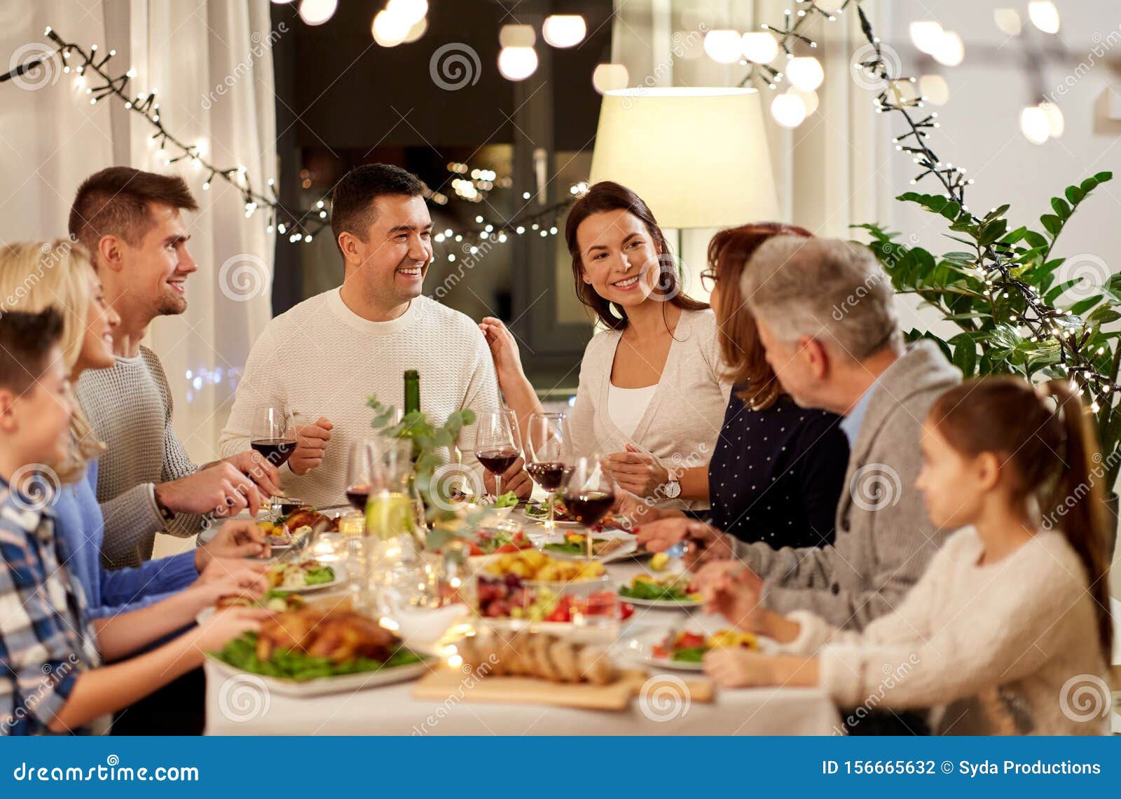 Happy Family Having Dinner Party at Home Stock Photo - Image of holiday