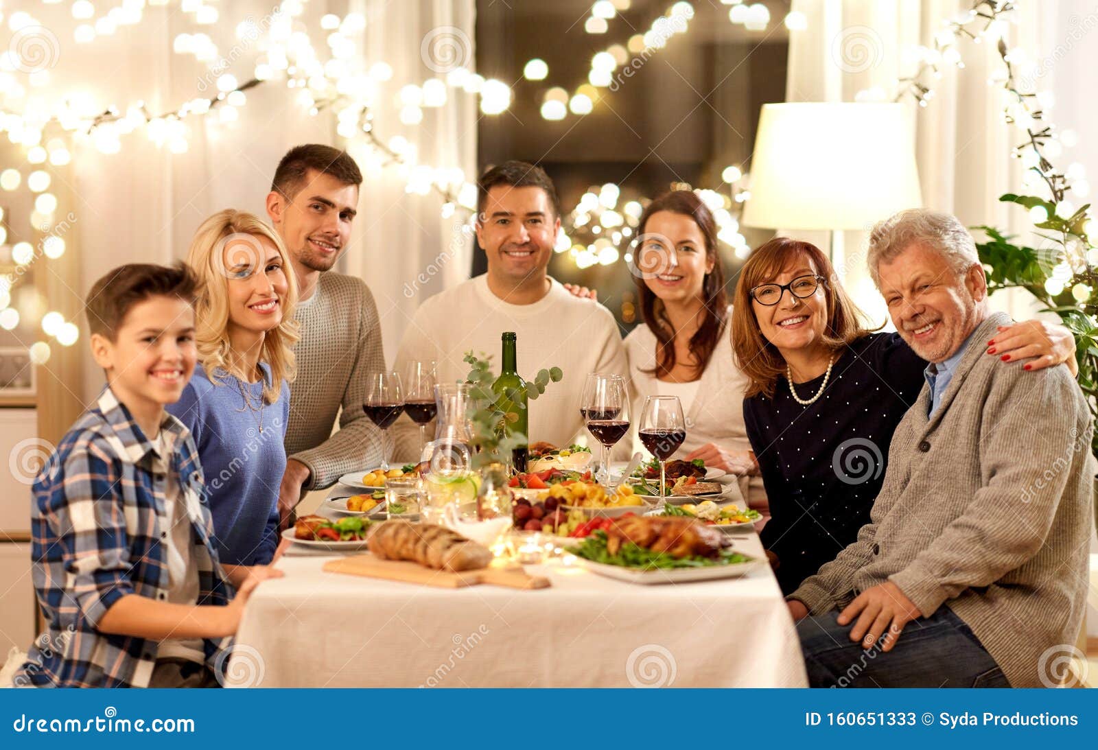Happy Family Having Dinner Party At Home Stock Image - Image of holiday