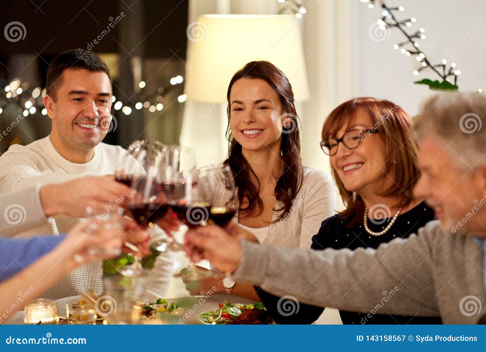 Happy Family Having Dinner Party at Home Stock Image - Image of