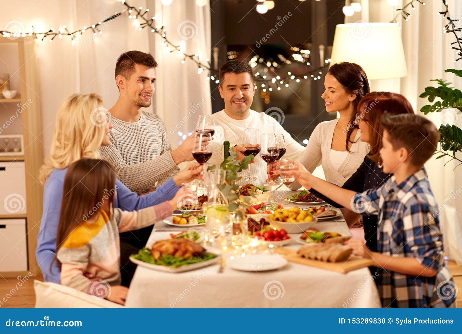 Happy Family Having Dinner Party at Home Stock Photo - Image of alcohol