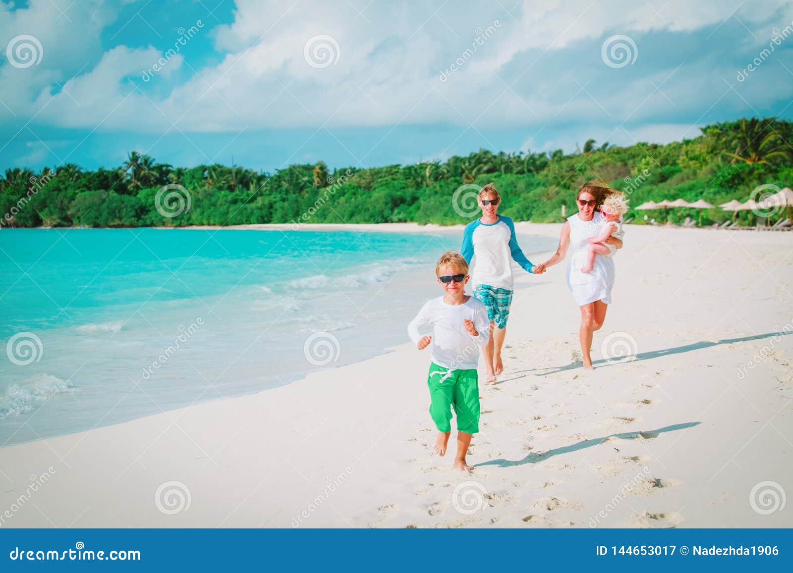 Happy Family With Kids Play On Beach Vacation Stock Image 