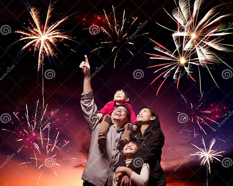 Happy Family Looking Fireworks Stock Photo - Image of family, freedom
