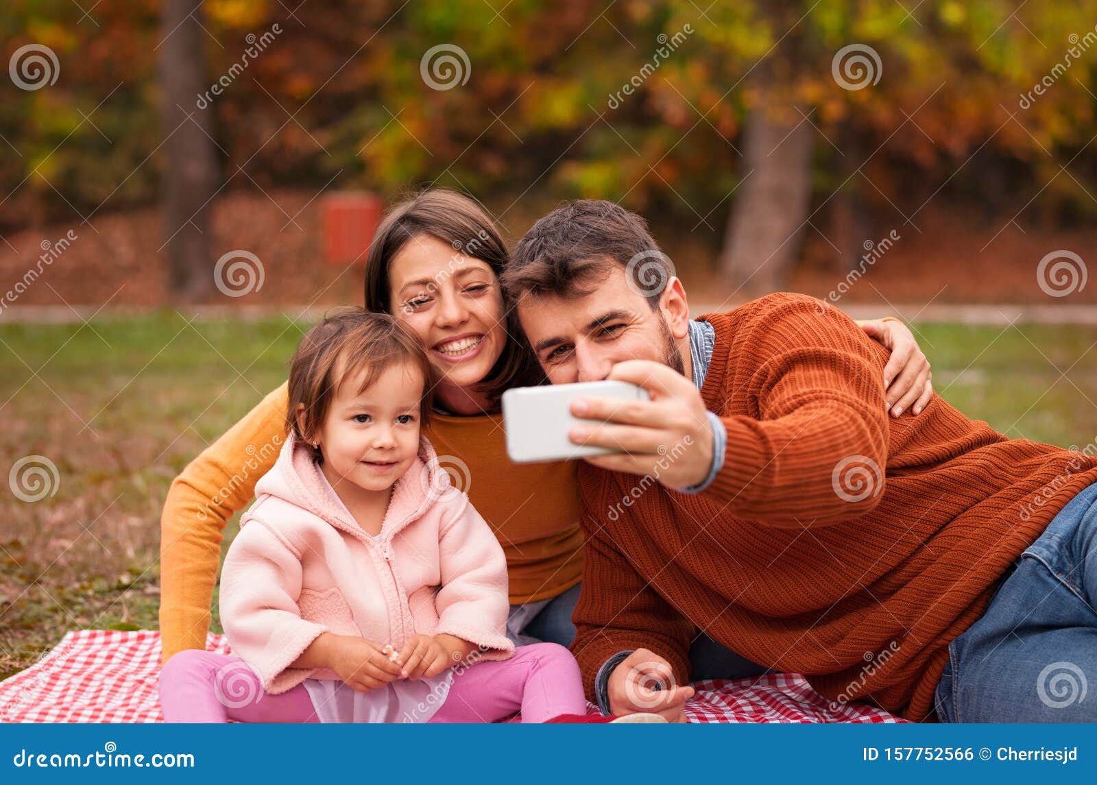 Happy family making selfie stock photo. Image of nature - 157752566