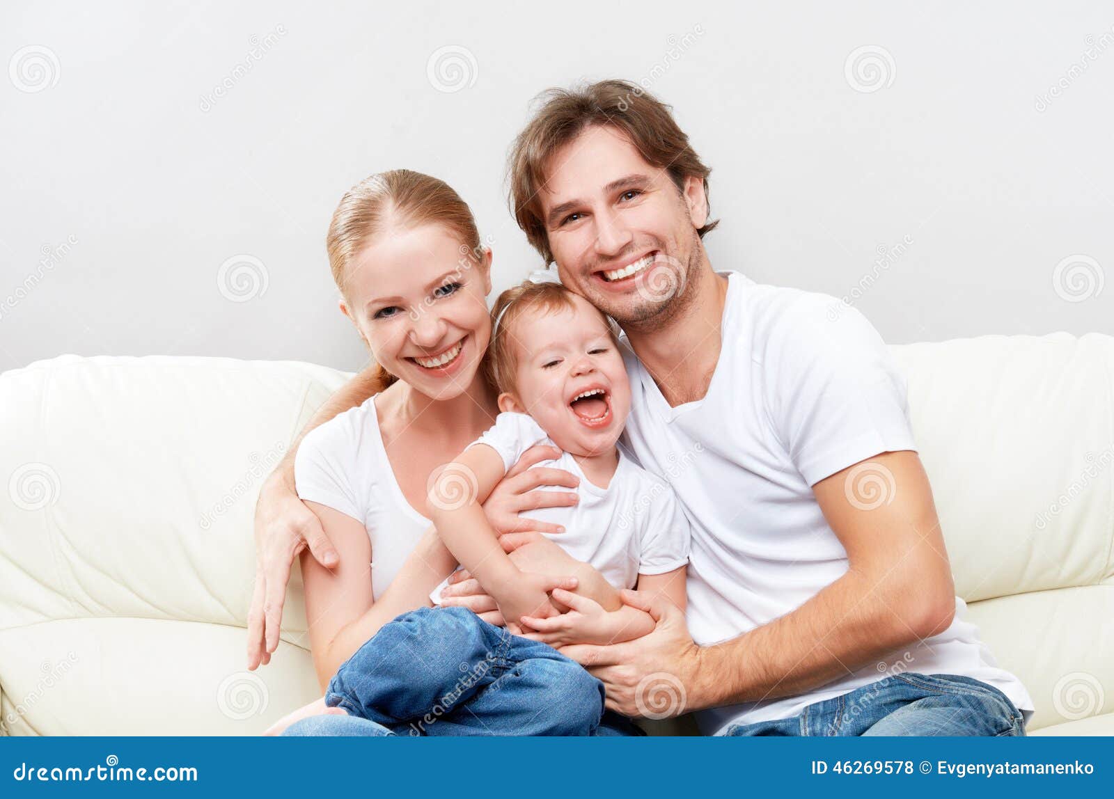 Happy Family Mother, Father, Child Baby Daughter at Home on Sofa ...