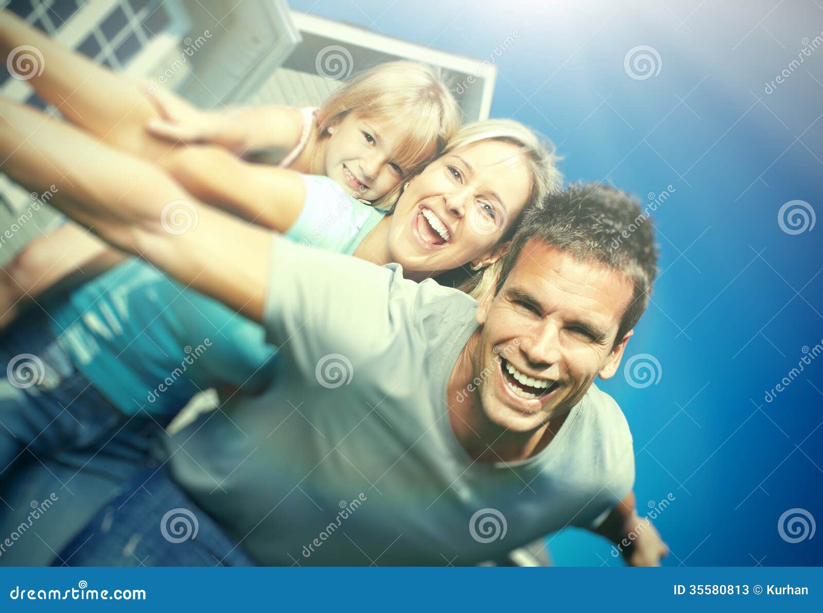 Happy Family Near the House Stock Image - Image of horizontal, home