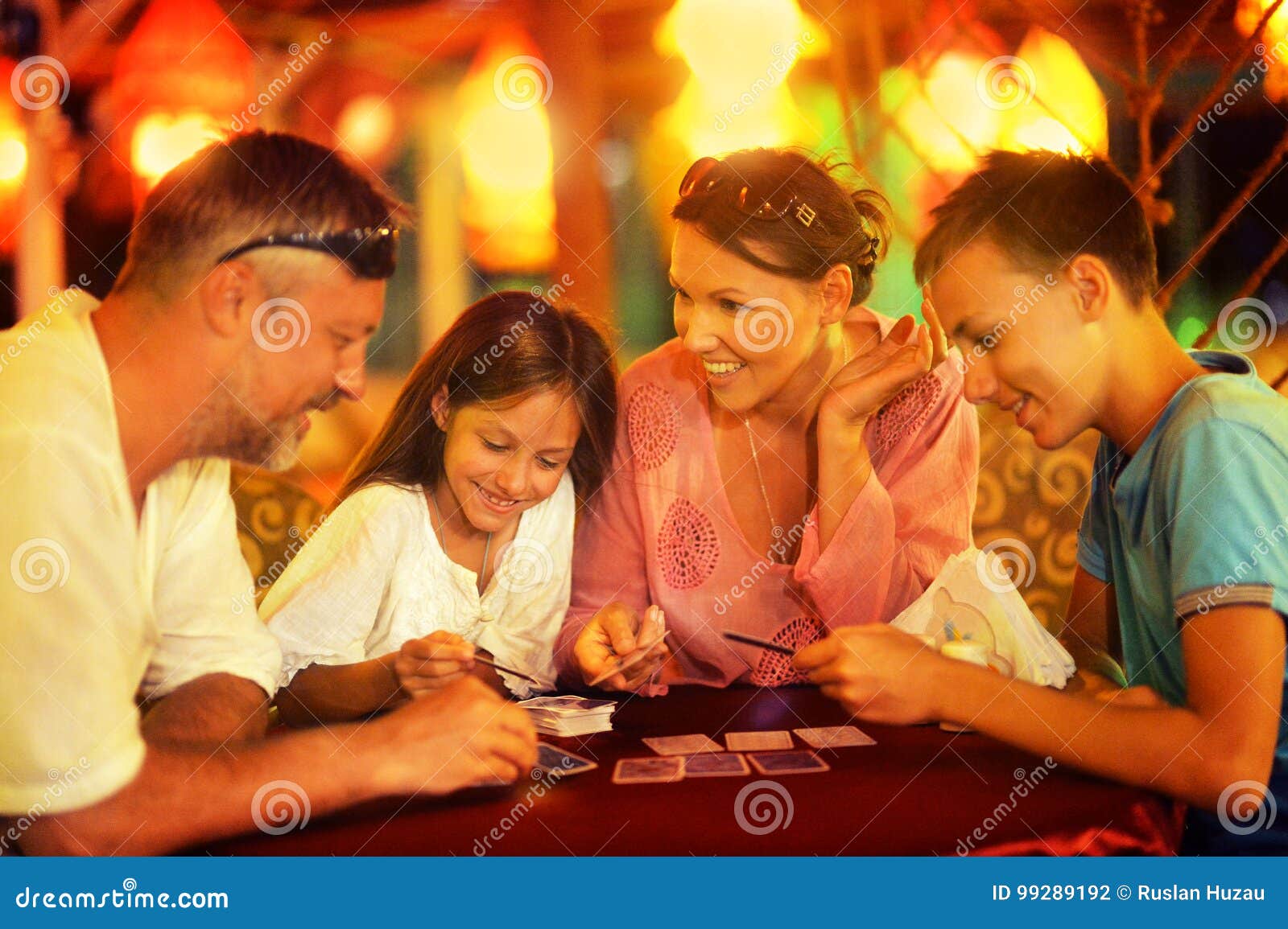 happy family playing cards
