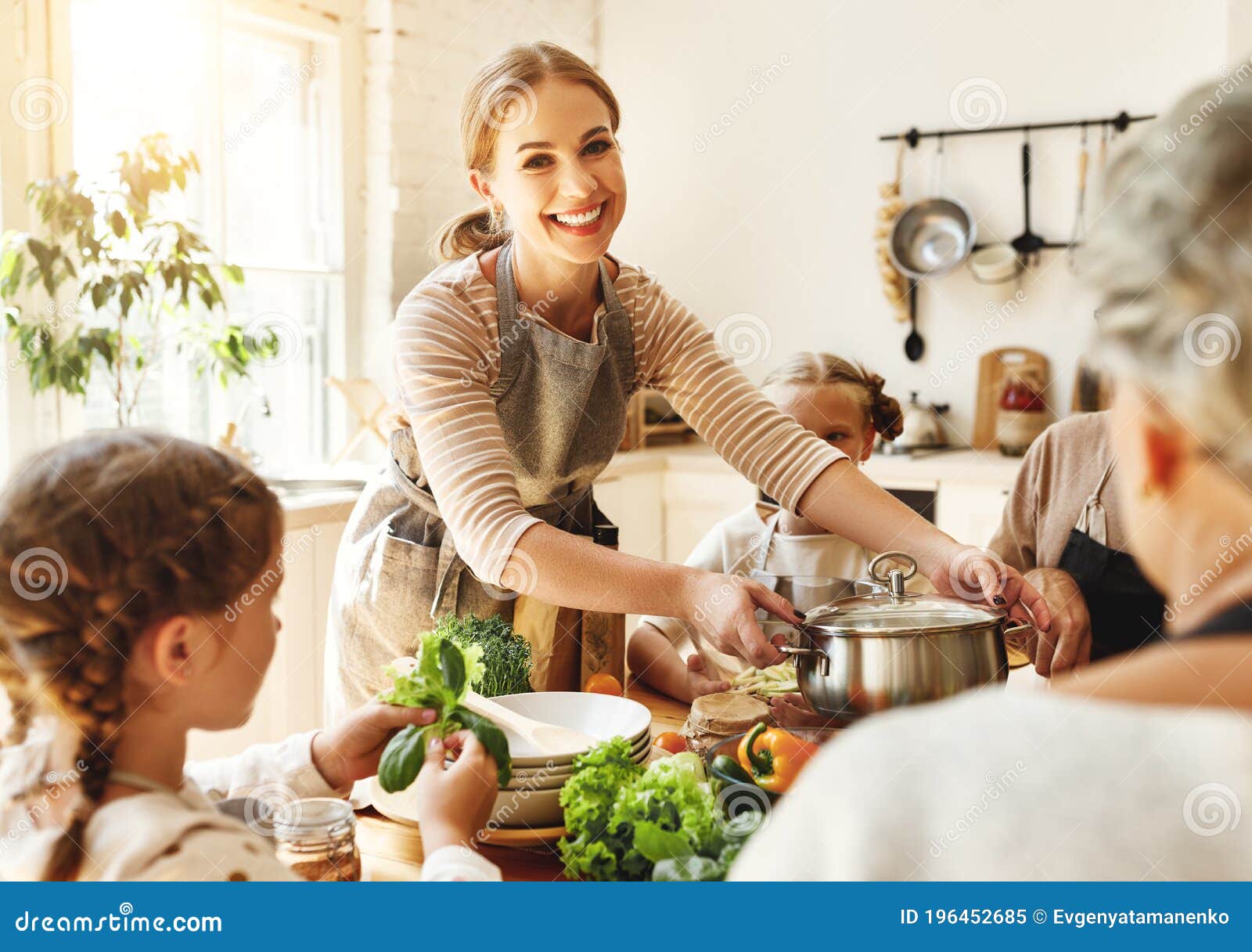 happy family preparing healthy lunch together