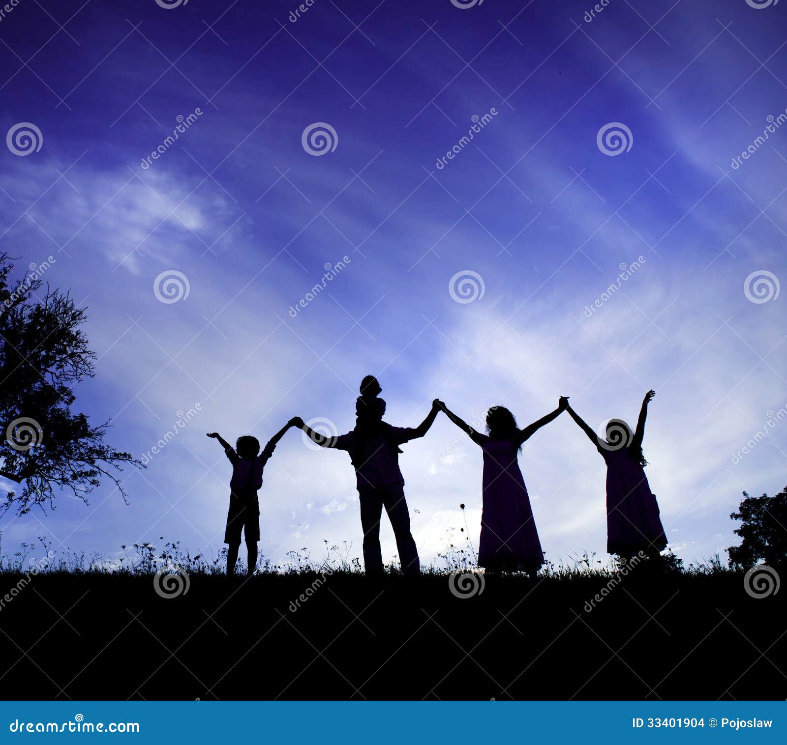 Happy family. Silhouettes of happy parents having fun with their children