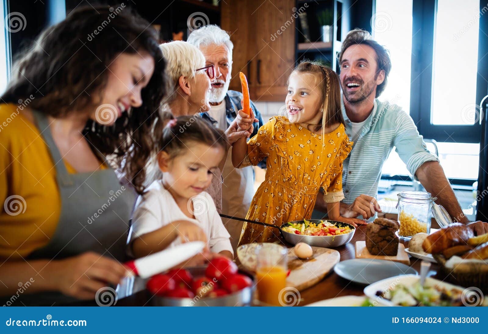 Happy Family Spending Quality Time Together In The Kichen Stock Photo