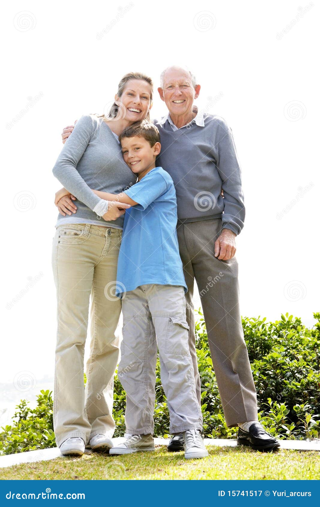 Happy Family Standing Together in the Park Stock Image Image of
