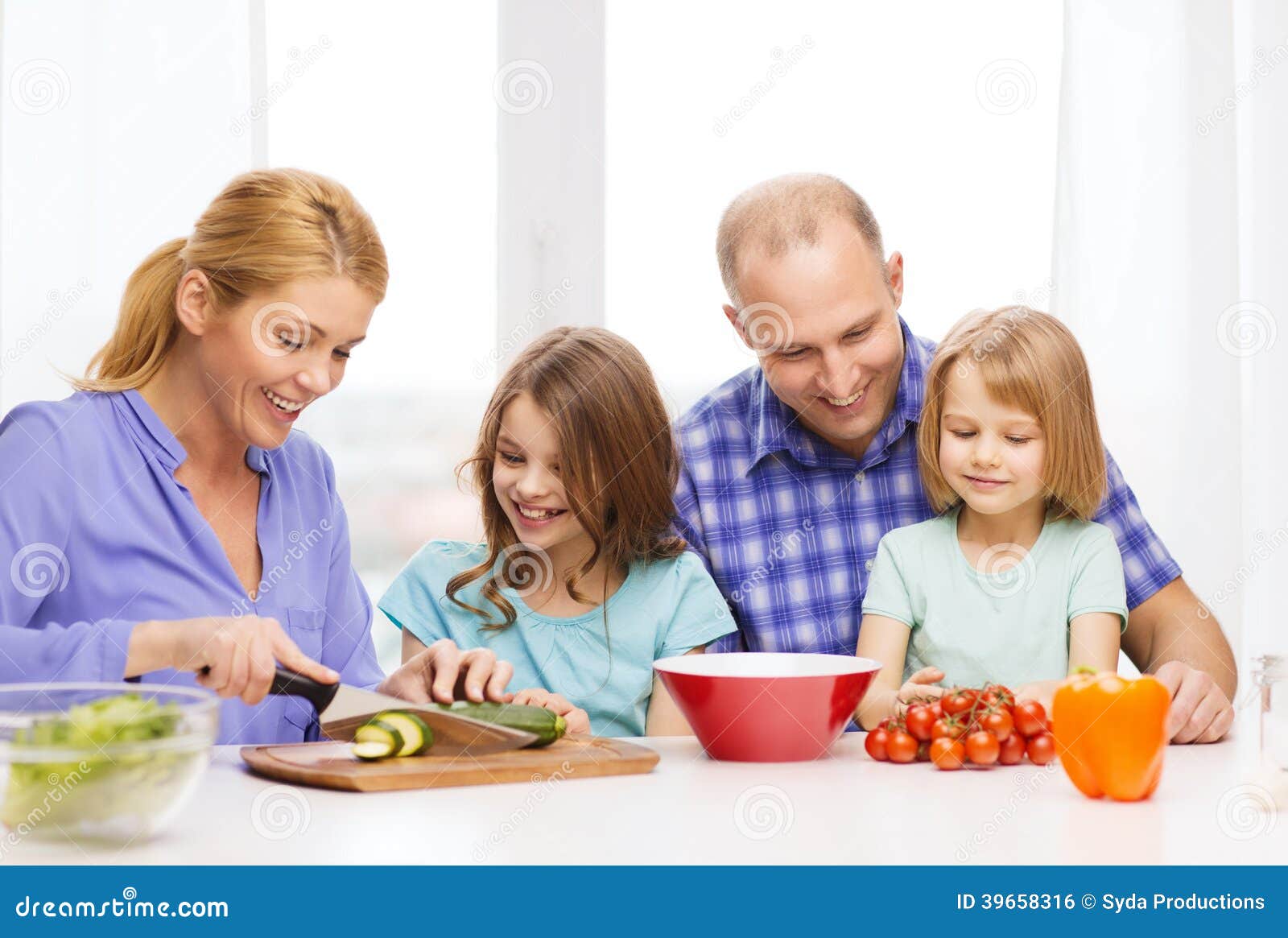 Happy Family With Two Kids Making Dinner At Home Stock Photo - Image of