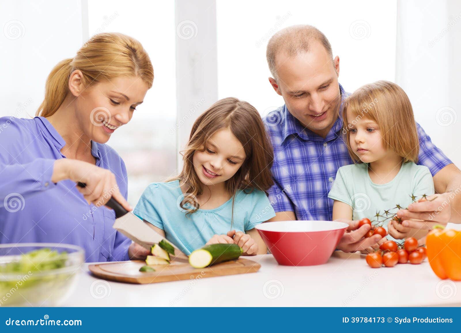 Happy Family with Two Kids Making Dinner at Home Stock Image - Image of