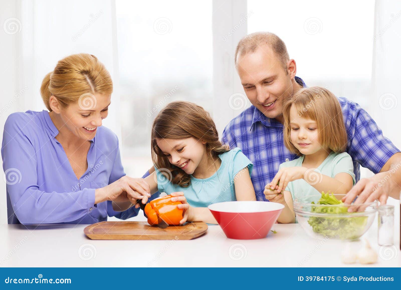 Happy Family with Two Kids Making Dinner at Home Stock Image - Image of