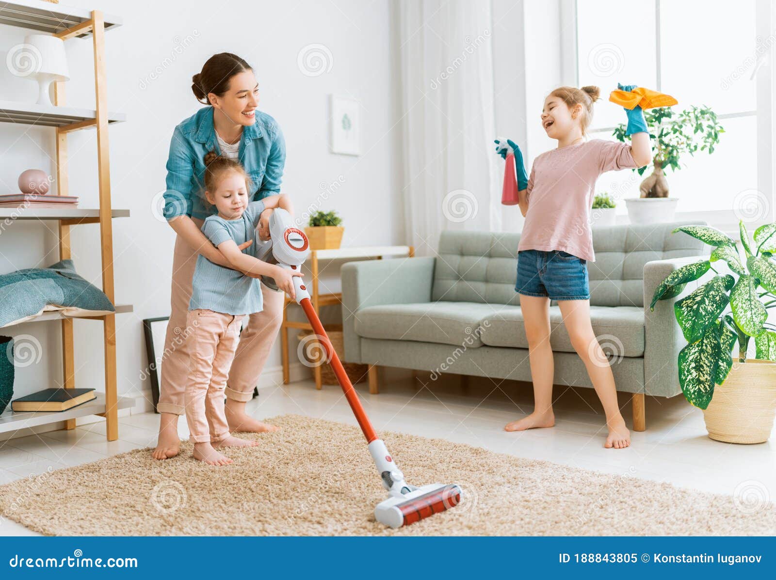 Family cleaning the room stock image. Image of housecleaning - 188843805