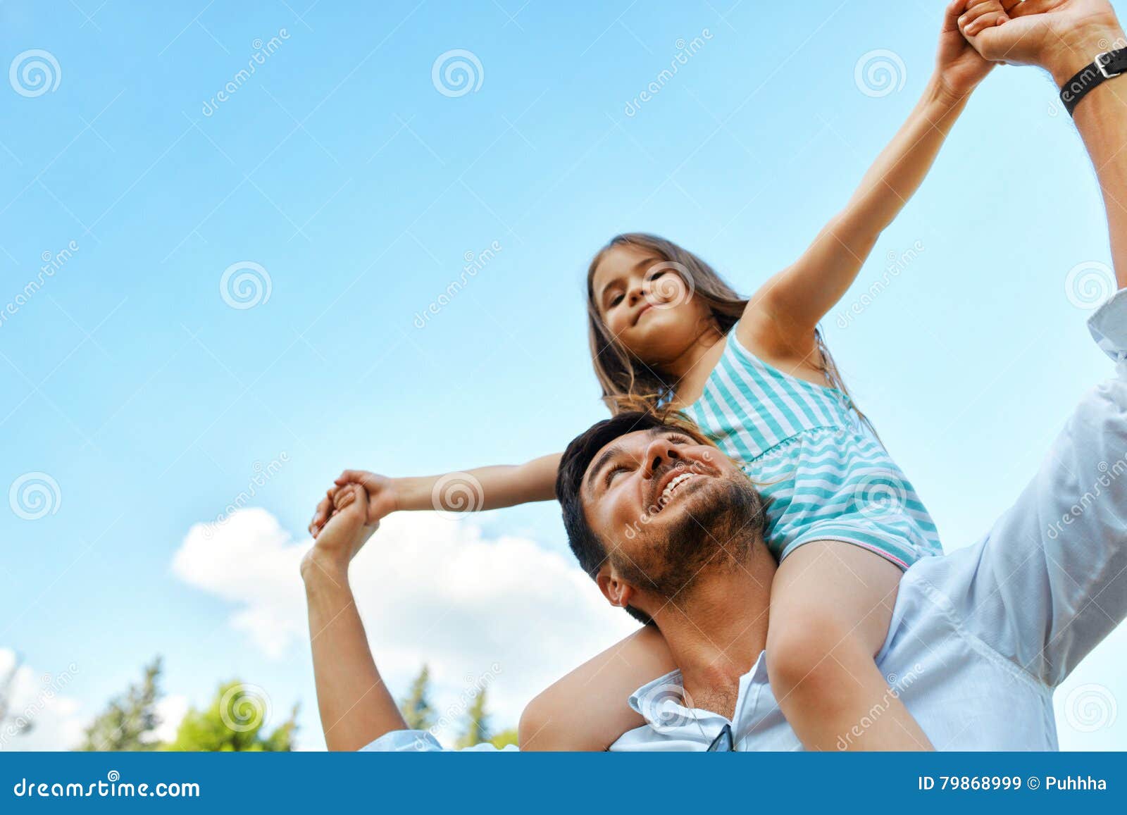 happy father and child having fun playing outdoors. family time