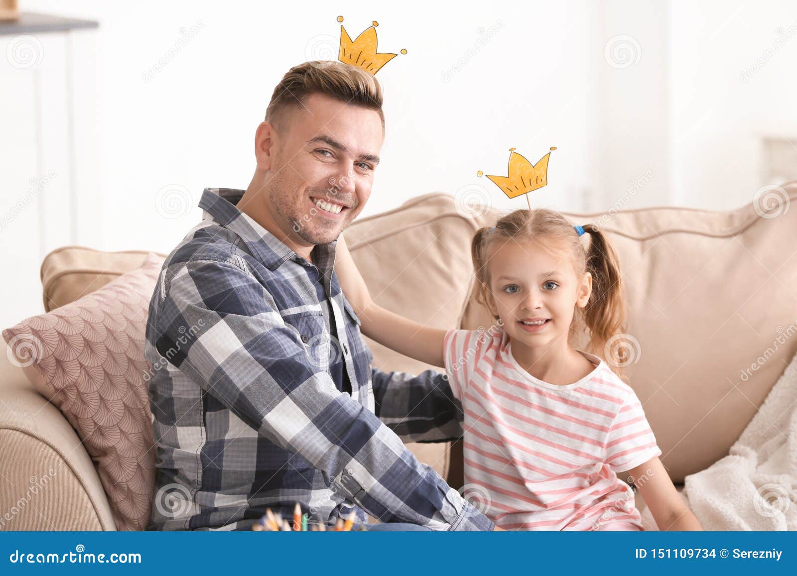Happy Father and Daughter Playing with Party Decor at Home Stock Photo
