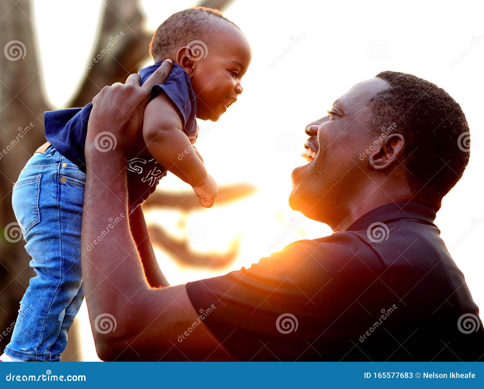 happy father and son at the park at sunset. father's day.