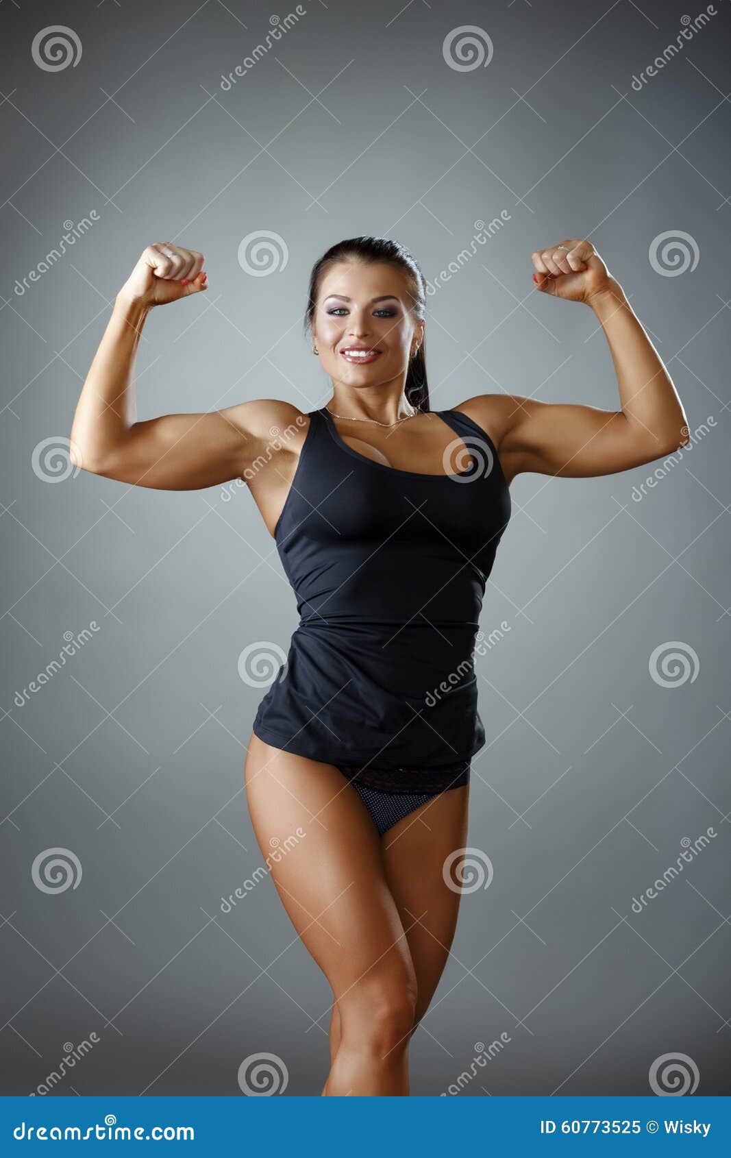 Happy Female Bodybuilder Showing Her Biceps Stock Image - Image of