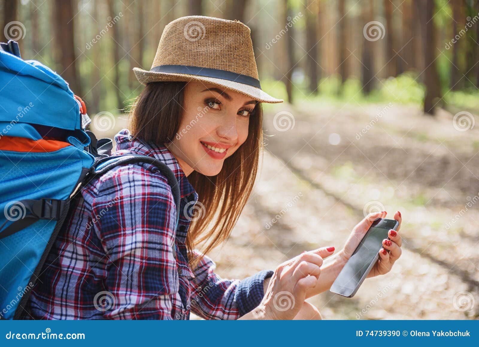 Happy Female Tourist Using Mobile Phone Stock Photo - Image of nature ...