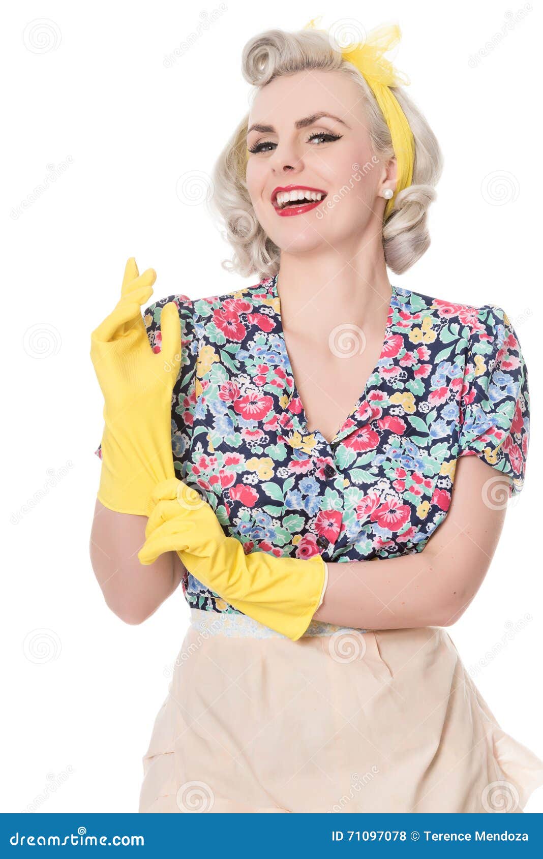 Happy Fifties Housewife Putting on Rubber Gloves, Humorous  photo