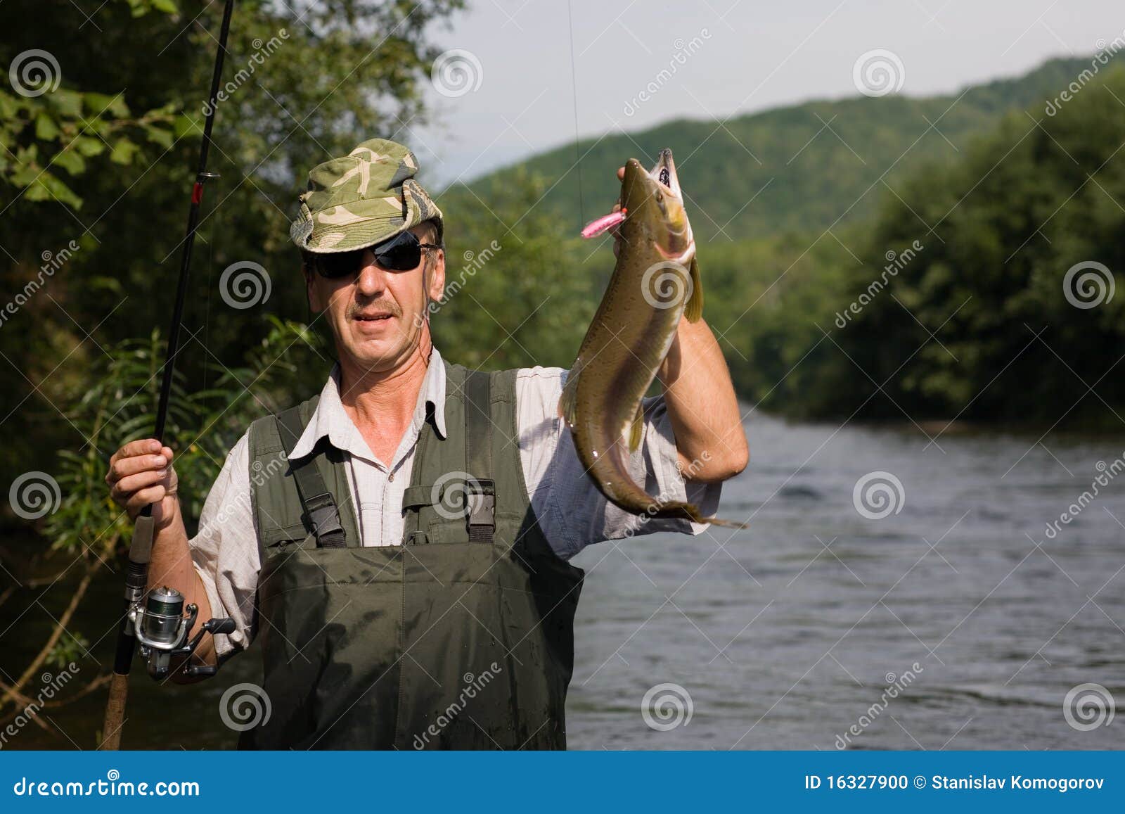 1,498 Mature Fisherman Catching Fish Stock Photos - Free & Royalty-Free  Stock Photos from Dreamstime