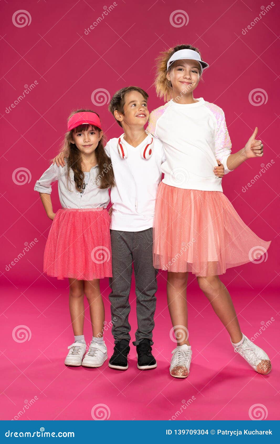 Happy Friends Over Pink Background Stock Photo Image of female