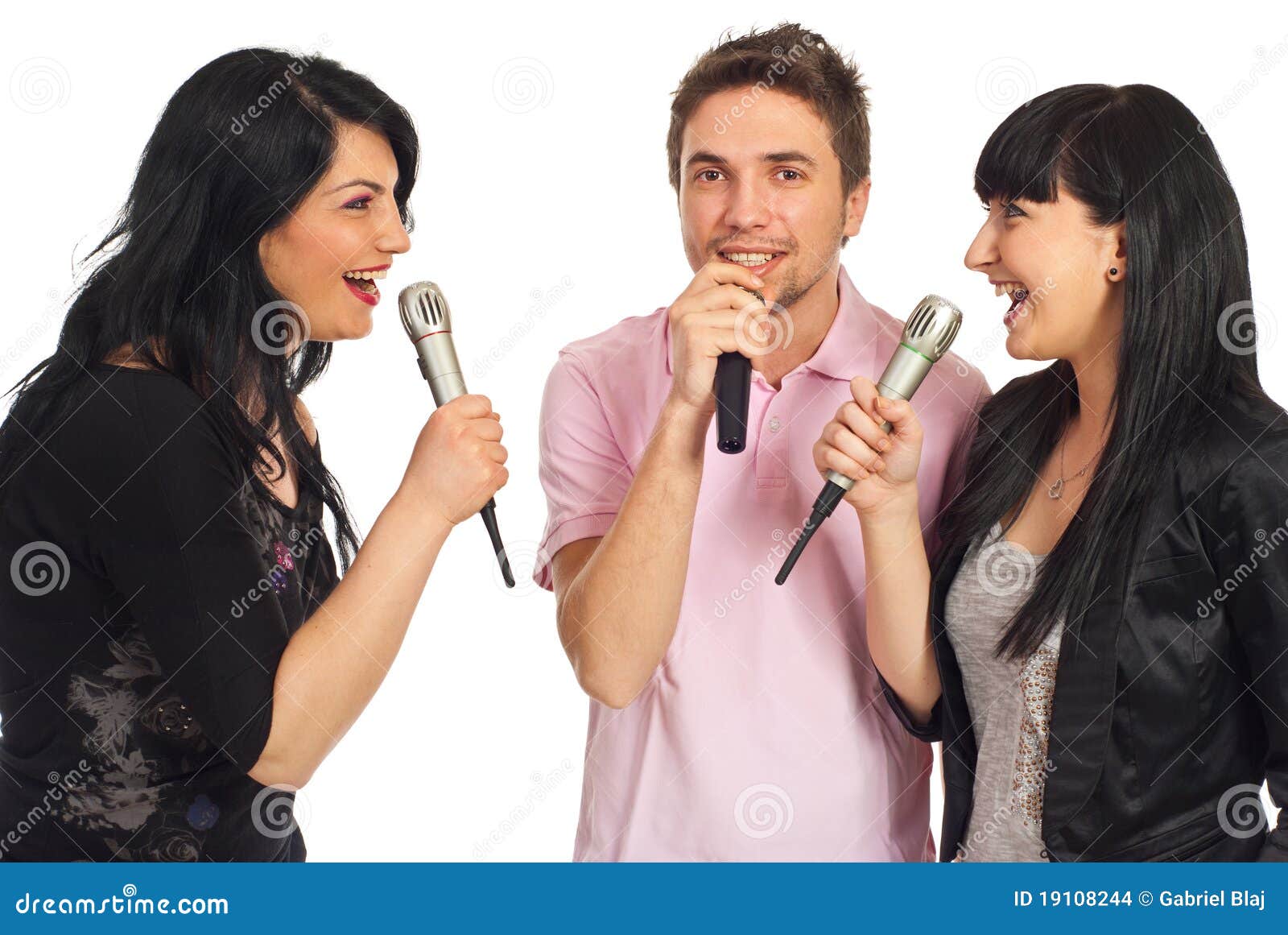 happy friends singing at karaoke party