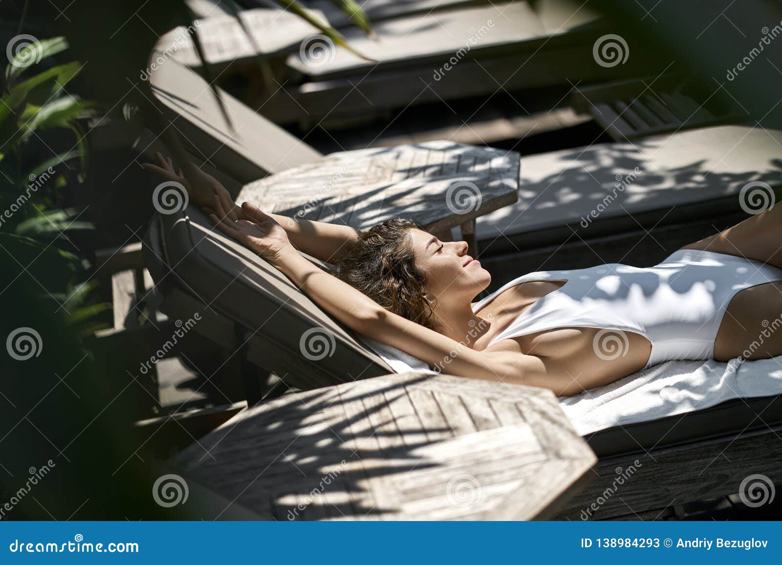 Brunette Girl In Swimsuit Sunbathing On Wooden Deck Chair Stock Image Image Of Beauty Holiday