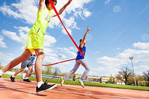 Happy Girl Crossing Finish Line On The Racetrack Stock Photo Image Of 