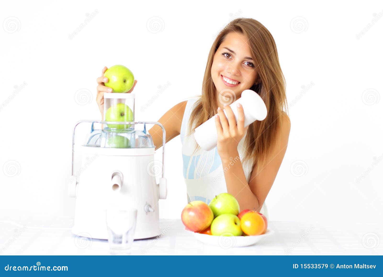 Happy girl about juicer stock image. Image of juicer 15533579